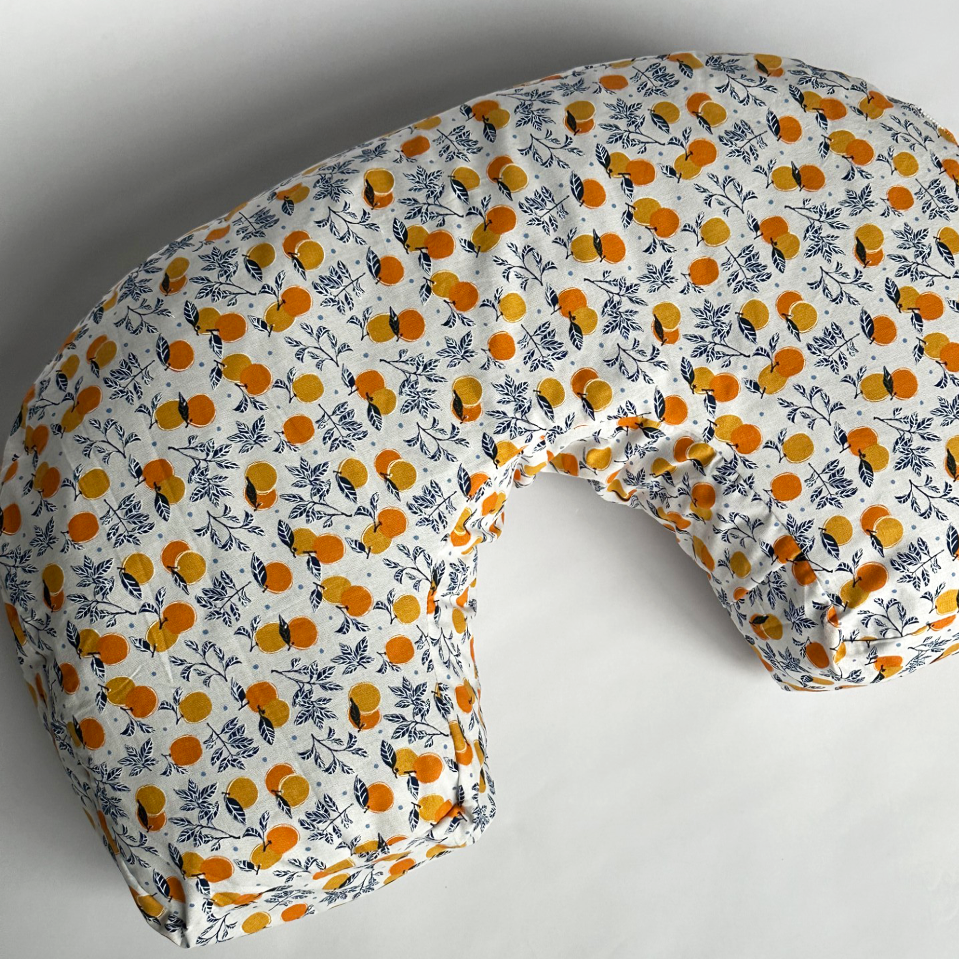 organic nursing pillow with clementine illustration