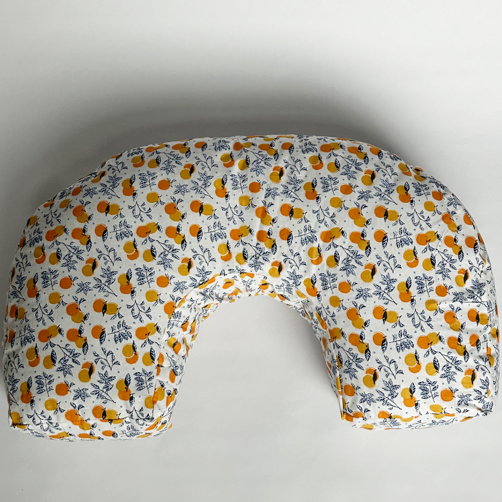 organic nursing pillow with clementine pattern